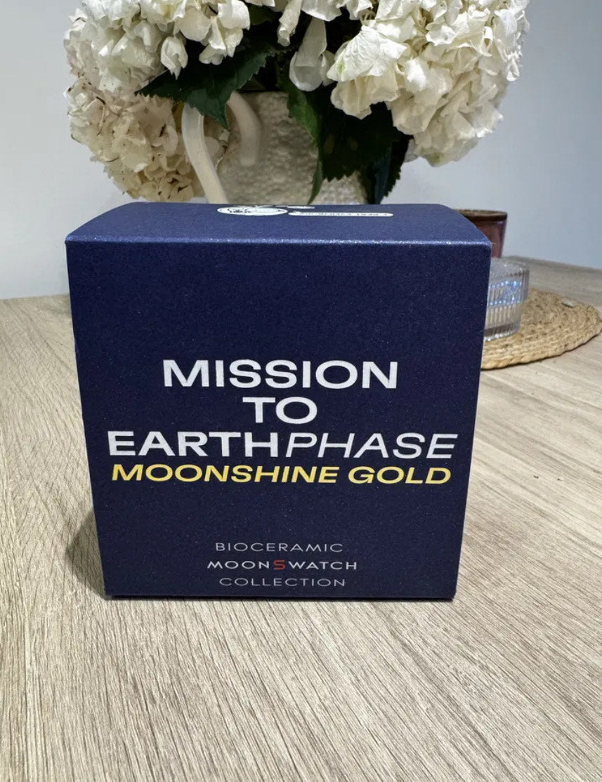 MOONSWATCH MISSION TO EARTHPHASE - MOONSHINE GOLD - SWATCH X OMEGA BIOCERAMIC
